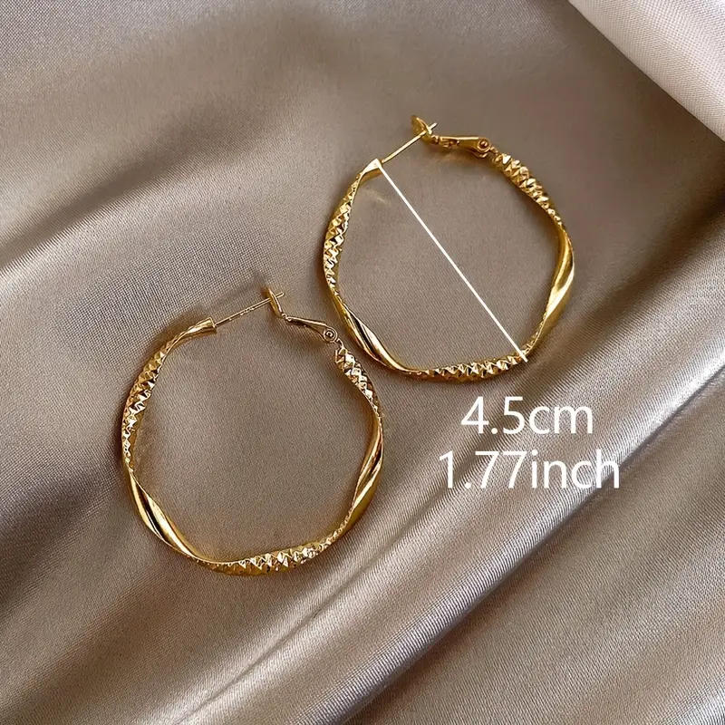 Golden Twisted Hoop Earrings – Elegant Iron Jewelry for Daily Wear & Trendy Gift