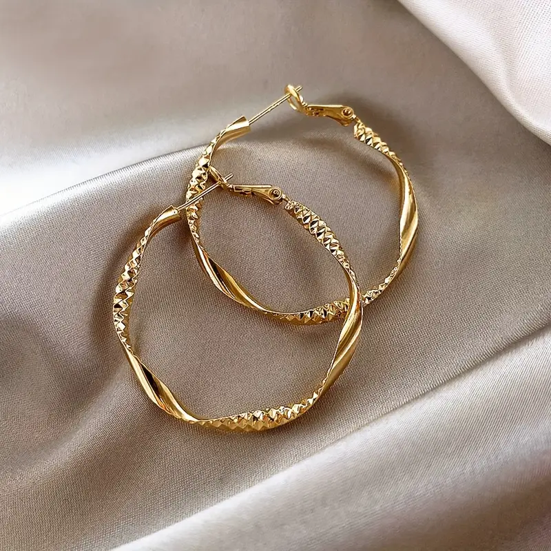 Golden Twisted Hoop Earrings – Elegant Iron Jewelry for Daily Wear & Trendy Gift