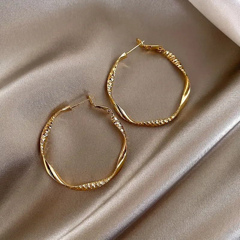 Golden Twisted Hoop Earrings – Elegant Iron Jewelry for Daily Wear & Trendy Gift