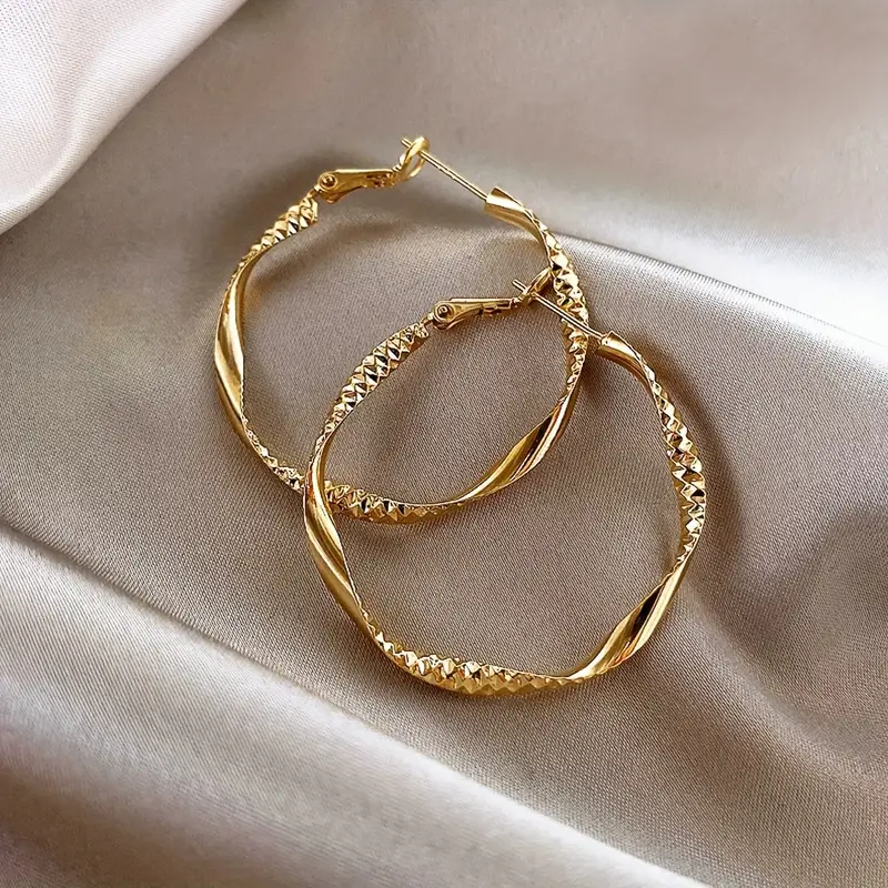 Golden Twisted Hoop Earrings – Elegant Iron Jewelry for Daily Wear & Trendy Gift